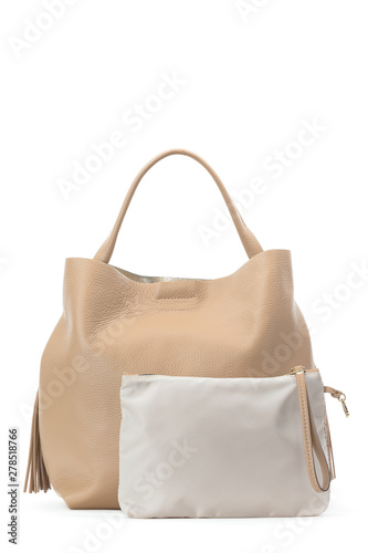 Capacious female purse handbag over a white background