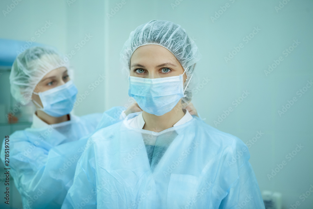 Medical staff getting ready for operation Medical staff getting ready for operation
