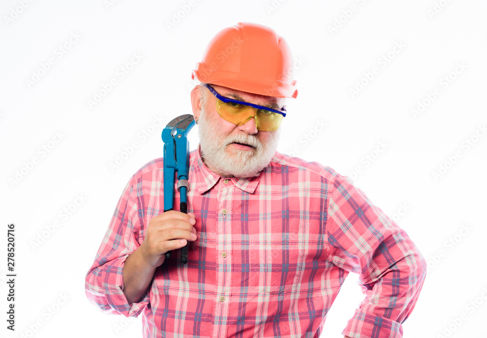 architect repair and fix. engineer worker. build and construction. professional repairman in helmet with gas wrench. mature bearded man in hardhat. man builder. Everything should be perfect architect repair and fix. engineer worker. build and construction. professional repairman in helmet with gas wrench. mature bearded man in hardhat. man builder. Everything should be perfect