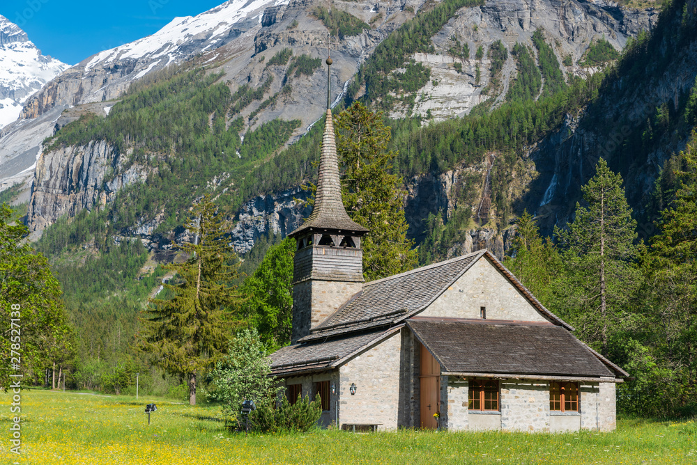 St. Marys Church with Bluemlisalp mountain close to Kandersteg St. Marys Church with Bluemlisalp mountain close to Kandersteg