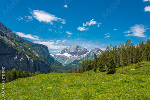 Scenic view between Oeschinen mountain station and Oeschinensee lake close to Kandersteg