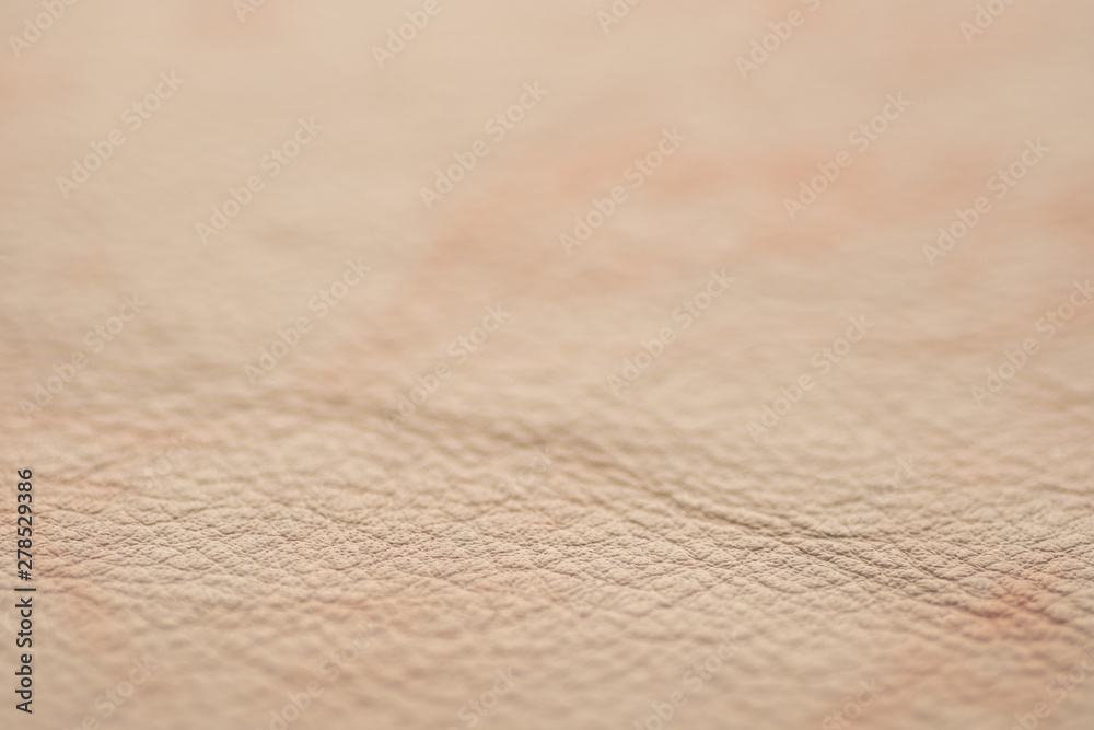 Texture of beige leather.