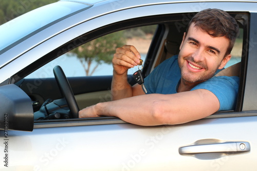 Cute driver holding car keys