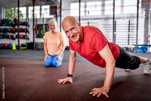 Senior people doing rehab workout at the gym