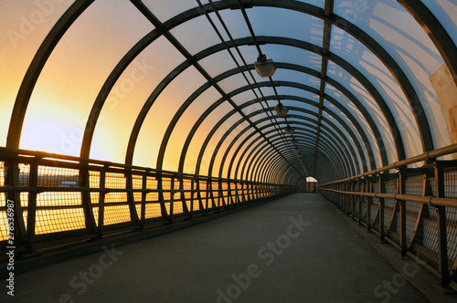 Pedestrian tunnel  crossing the roadway. At sunset