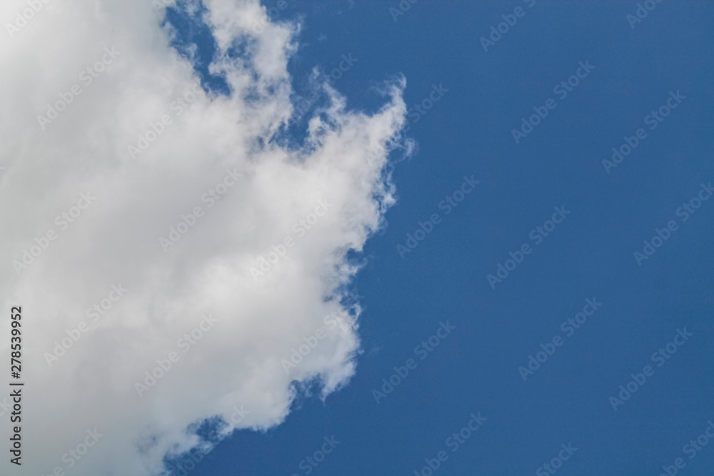 Obraz premium white clouds in the blue sky. background