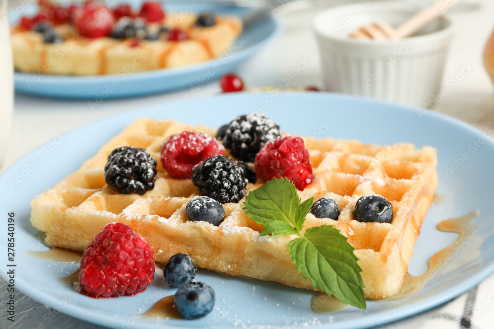 Composition of breakfast with belgian waffles, space for text Composition of breakfast with belgian waffles, space for text
