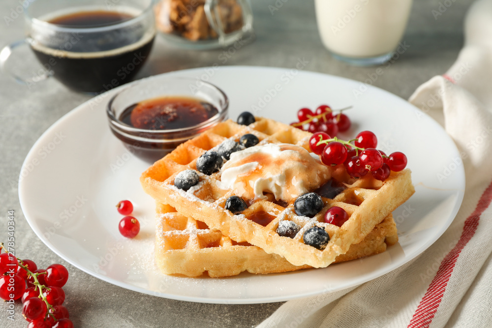 Composition of breakfast with belgian waffles, space for text Composition of breakfast with belgian waffles, space for text