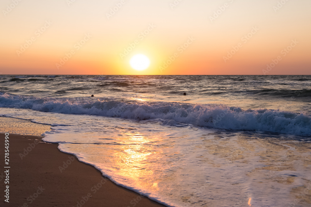 Colorful dramatic sunrise over the sea. the down of the sun over the sea natural colors. Nature composition