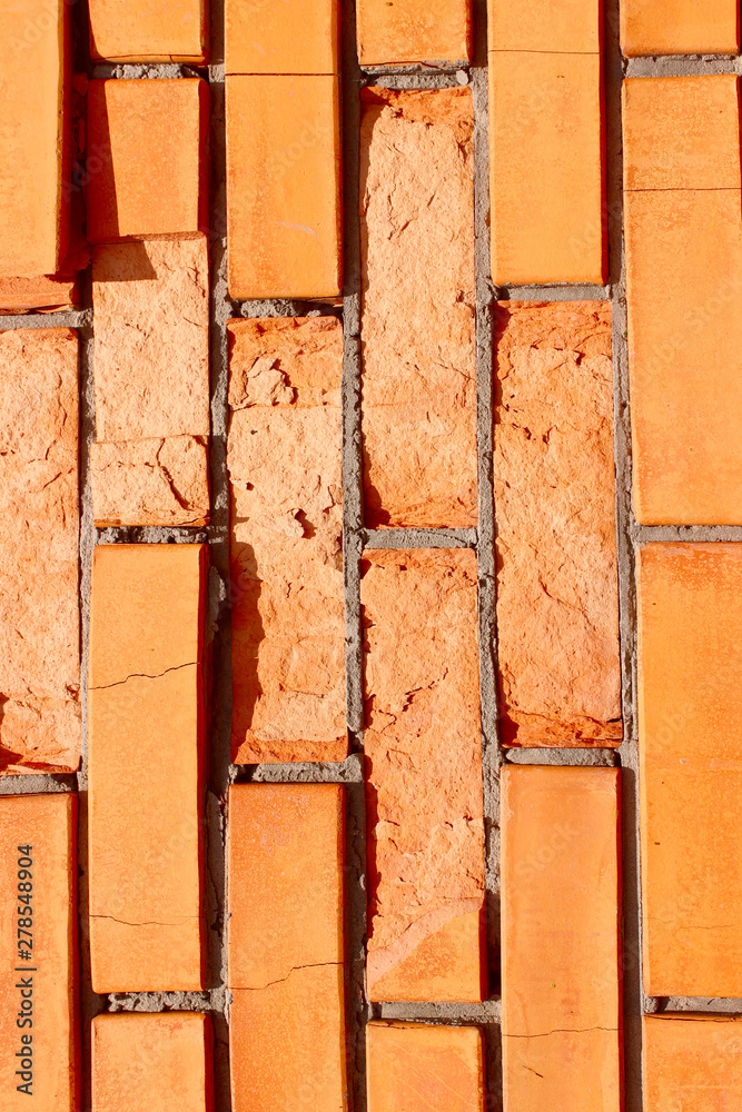 Brick texture background. Abstract textured background. Destroyed wall texture, cropped shot.