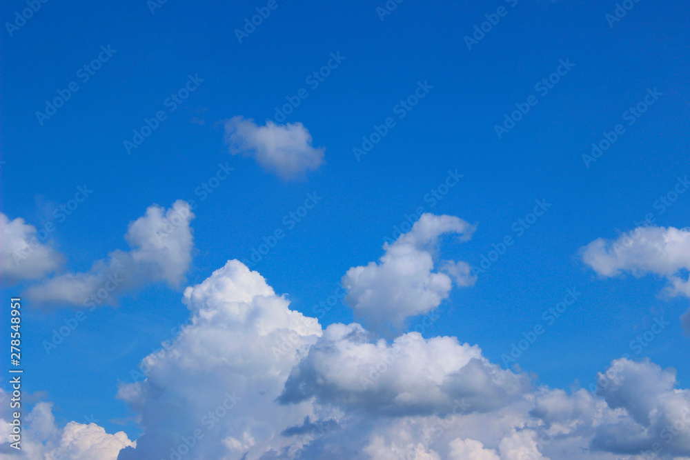 Blue sky and white clouds. Beautiful nature background. Freedom, nature concept.