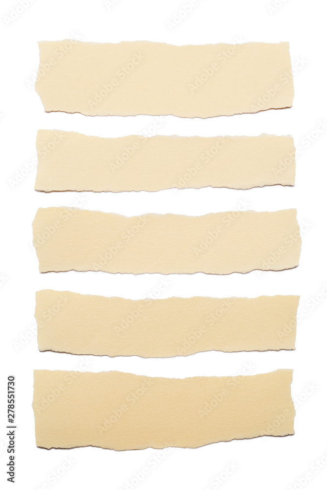 Collection of beige paper stripes with torn edges isolated on white background