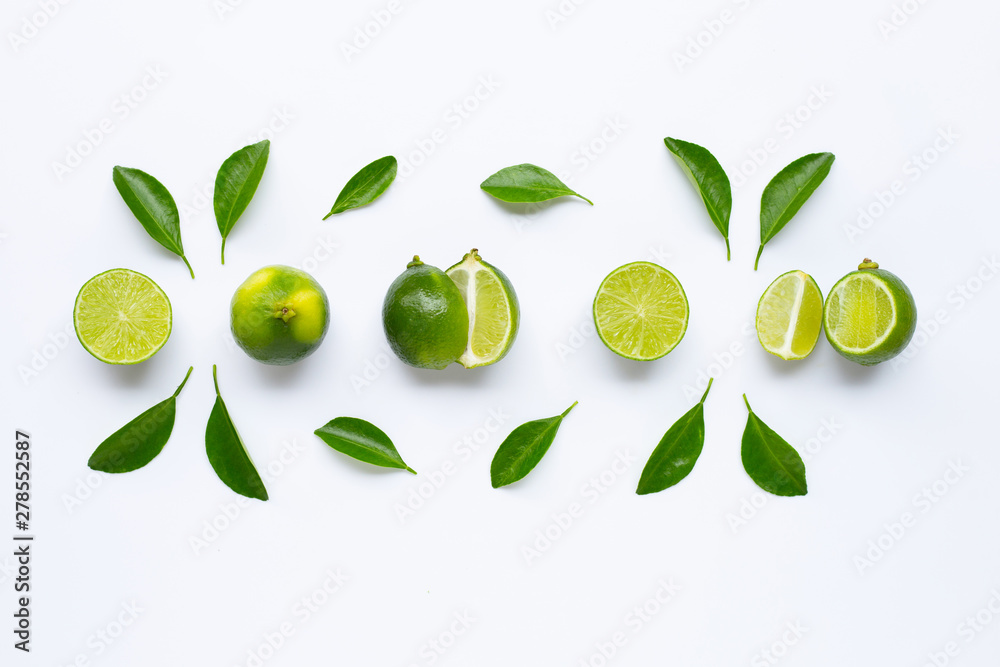 Fresh limes with leaves isolated on white Fresh limes with leaves isolated on white