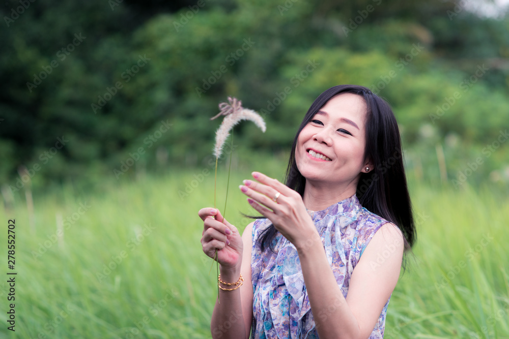 Freedom happy girl smilling with long hair on the meadow field Freedom happy girl smilling with long hair on the meadow field