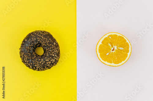 Top view donut vs fruit photo