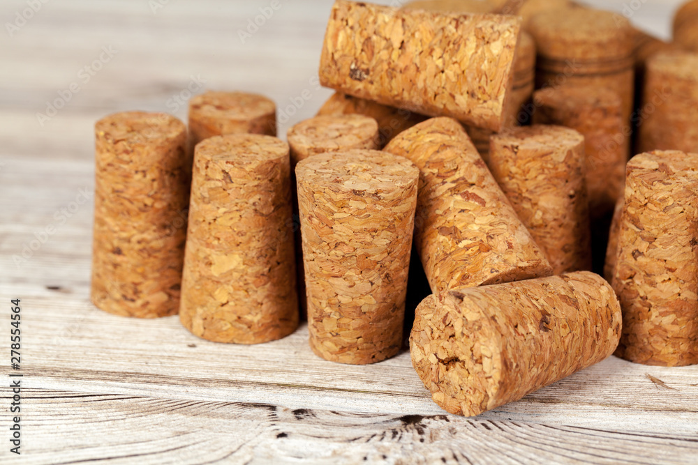 Bunch of wine corks on wooden table