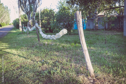 Fence made of old plastic bottles