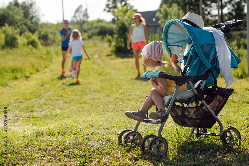 Family is preparing to do daily physical exercises outside Family is preparing to do daily physical exercises outside