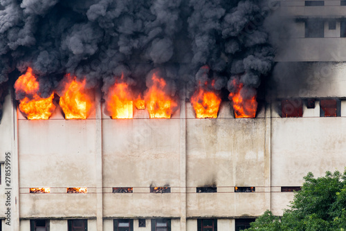 A fire broke out in the warehouse and the fire brigade was putting out the fire.