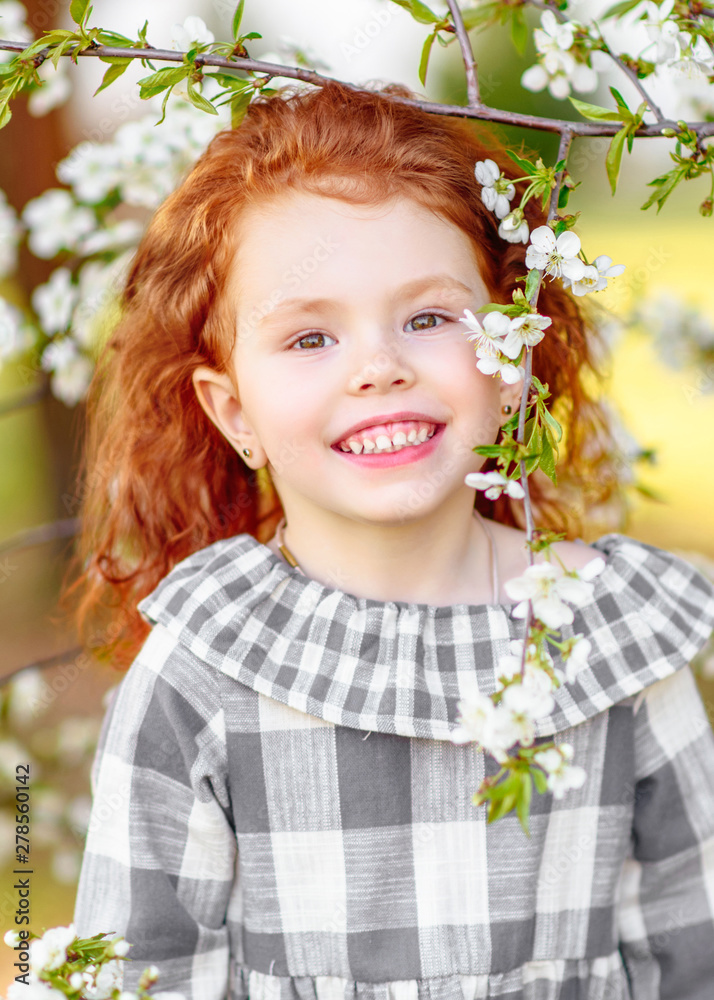 portrait of little girl outdoors in summer portrait of little girl outdoors in summer