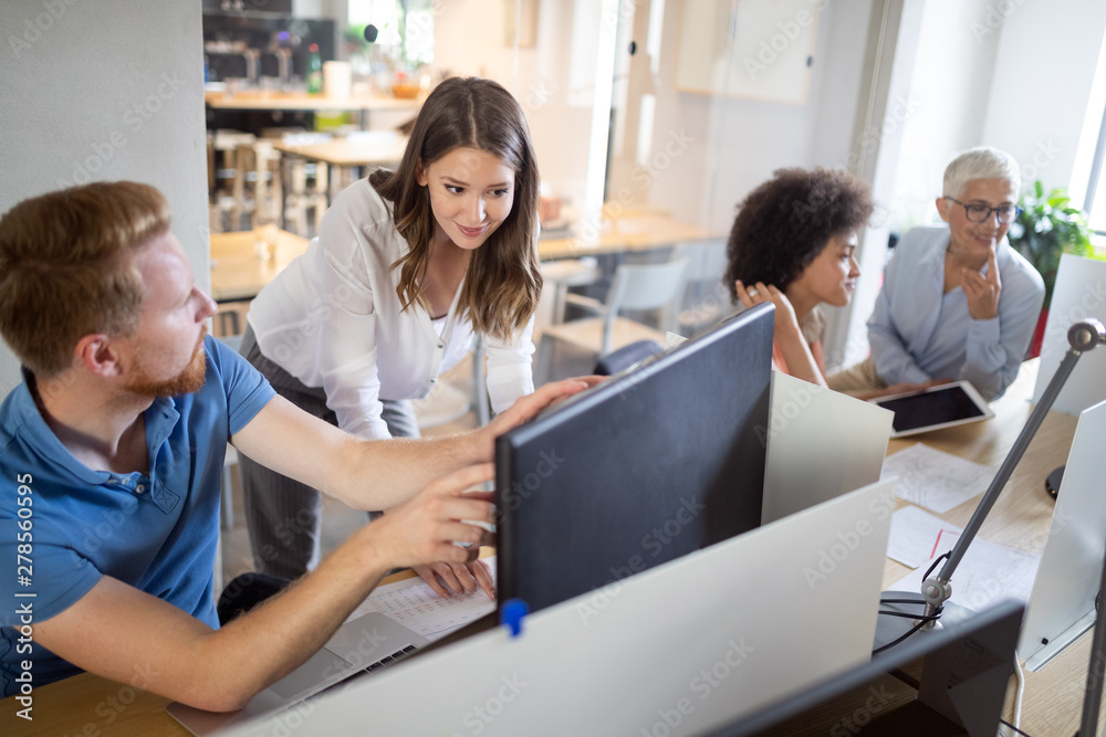 Programmer working in a software developing company office Programmer working in a software developing company office
