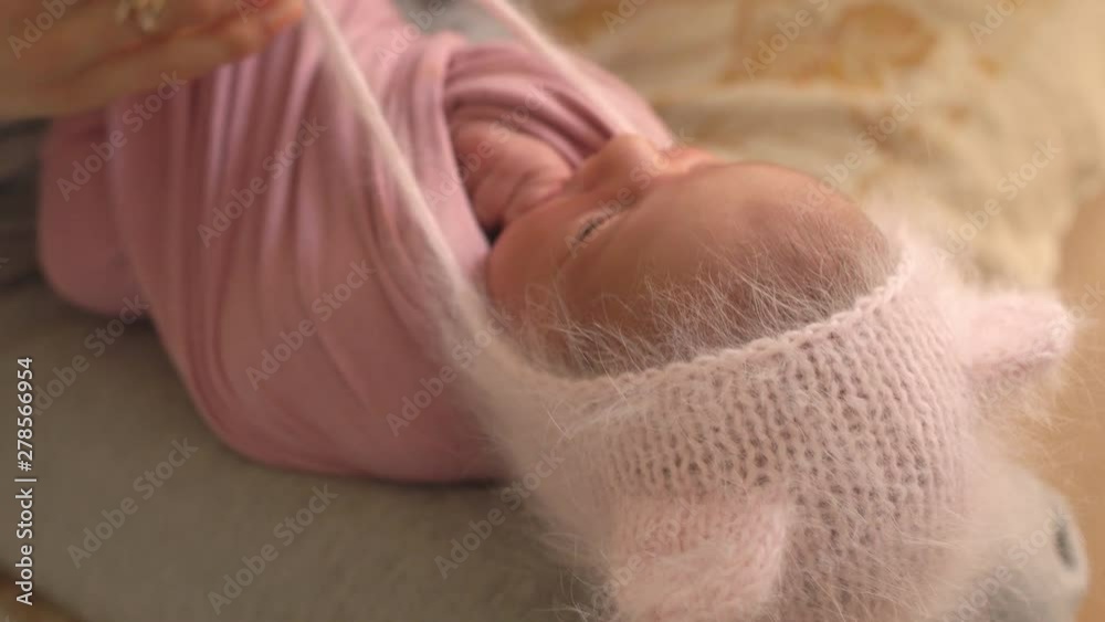 Little caucasian girl of two months in beautiful elegant clothes posing for the camera in the studio, photo session with children, photosession Little caucasian girl of two months in beautiful elegant clothes posing for the camera in the studio, photo session with children, photosession