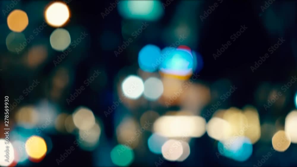 Blurred defocused image of night festival in street restaurant, background with color bokeh. Blurred defocused image of night festival in street restaurant, background with color bokeh.