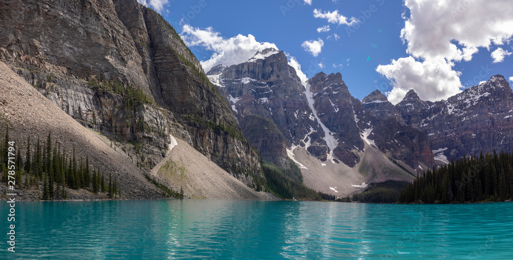 Beautiful turquoise waters of Lake Moraine, embraced by the Valley of the Ten Peaks in Banff National Park, Alberta, Canada