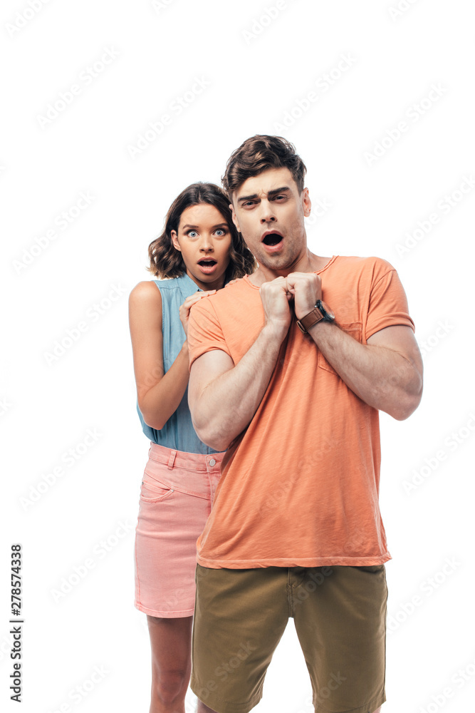 frightened man and woman looking at camera and gesturing isolated on white frightened man and woman looking at camera and gesturing isolated on white