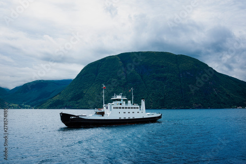 Amazing blue landscape and ferry transportation on Dalsfjord in Norway.