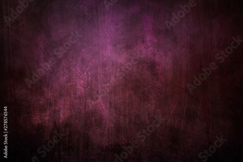 Dark pink grungy background with spotlight background