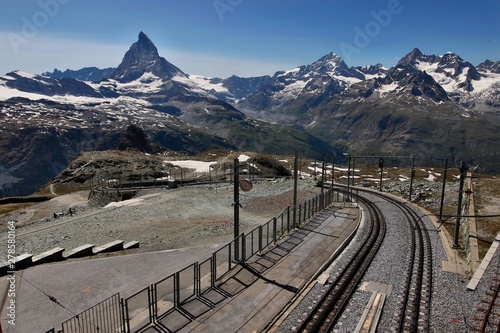 Railway of a train to Gornergrat with Matterhorn in the background on a sunny day