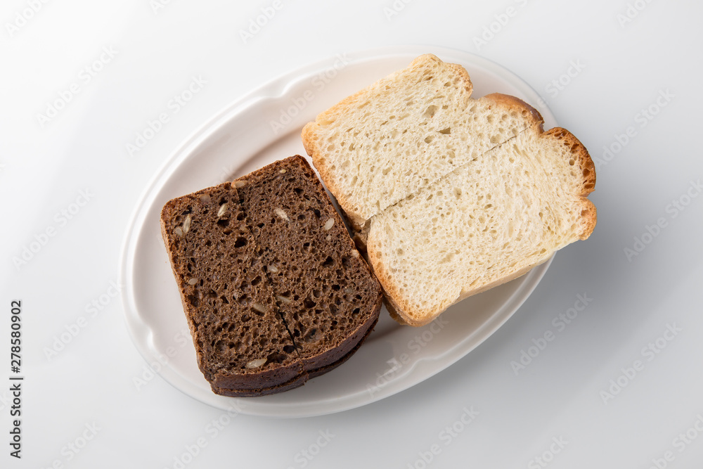 Sliced bread. Beautifully decorated catering banquet menu. Food snacks and appetizers for buffet. Isolated on white background