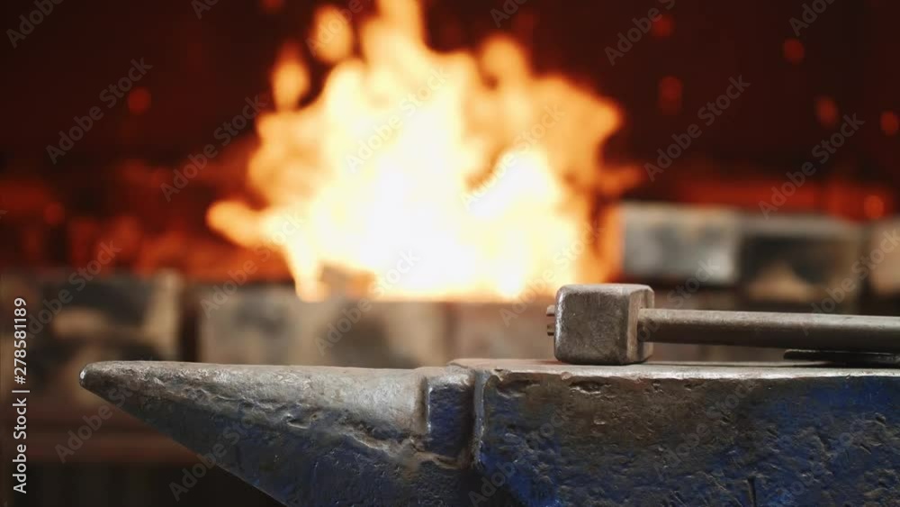 Workplace for forging metal. Hammer on anvil in forge on fire ...