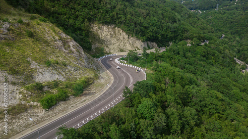 Aerial view from drone - winding road from the high mountain pass in Sochi  Russia.