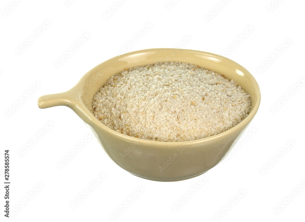 Pile of breadcrumbs in a bowl isolated on white background Pile of breadcrumbs in a bowl isolated on white background