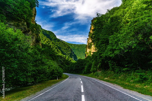 Road in the mountains, Caucasus mountains, sunny day