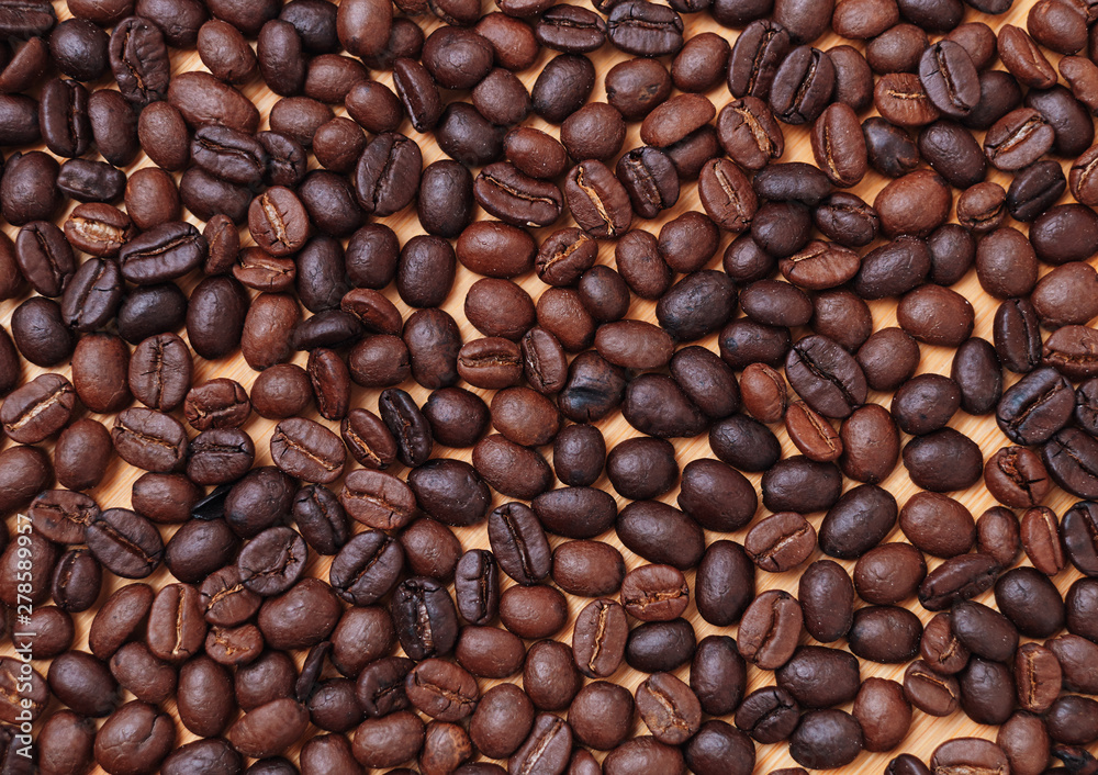 Full background of dark roasted coffee bean Full background of dark roasted coffee bean