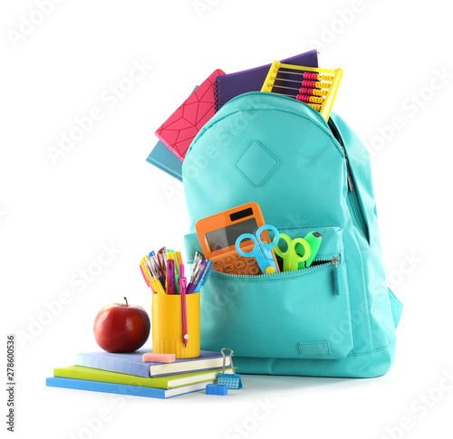 Принти на полотні Stylish backpack with different school stationary and apple on white background