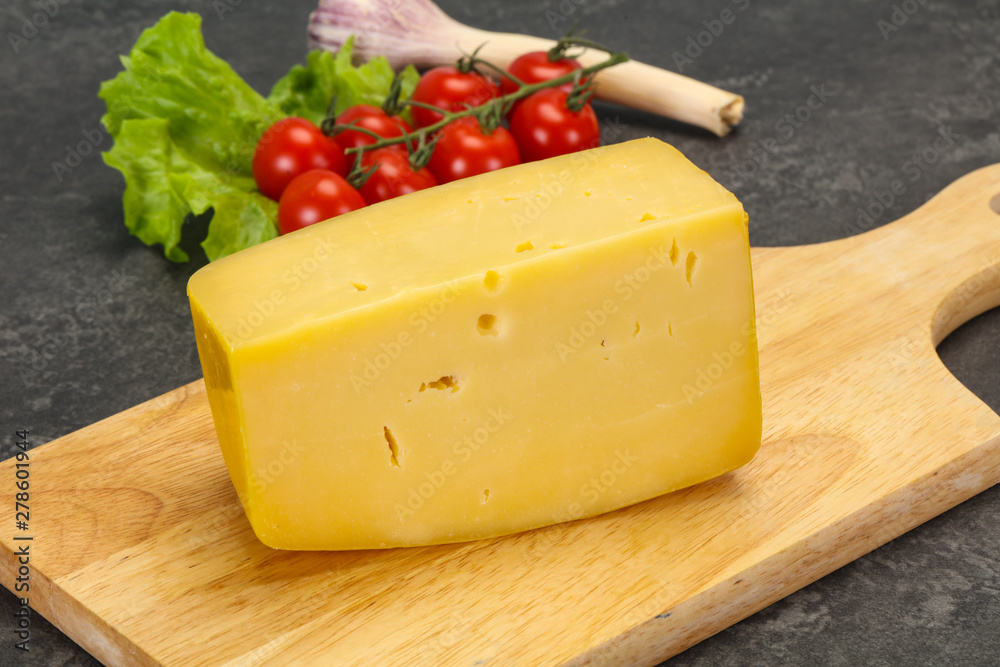 Hard yellow tasty cheese brick Hard yellow tasty cheese brick