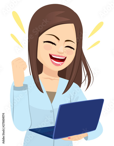 Successful happy businesswoman holding laptop cheering with fist up celebrating