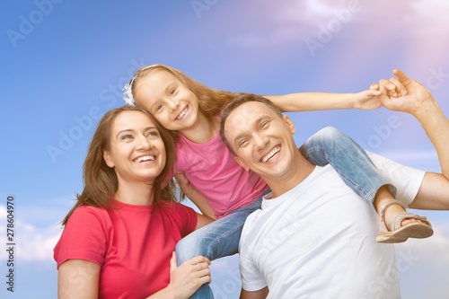 Happy cheerful family on background