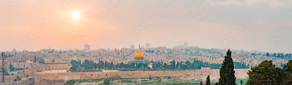 Panoramic view of Jerusalem old city and the Temple Mount during a dramatic colorful sunset
