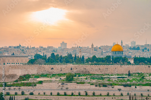 Panoramic view of Jerusalem old city and the Temple Mount during a dramatic colorful sunset photo