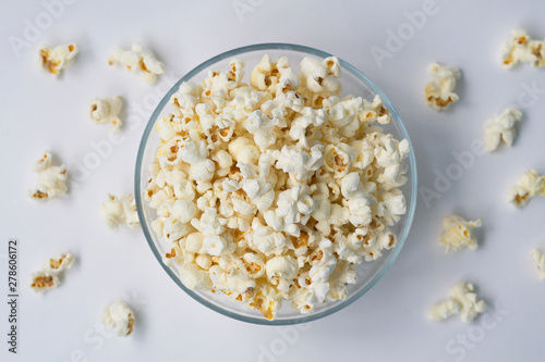 popcorn in a bowl on white background
