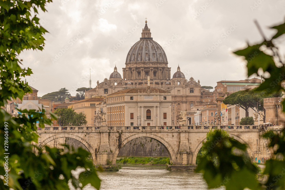 View of the Vatican, St. Peter's Basilica, St. angel bridge over the Tiber river. Rome, Italy.