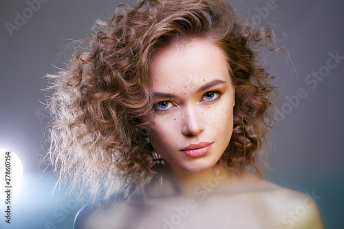 Beautiful woman. amazing curly girl with make-up