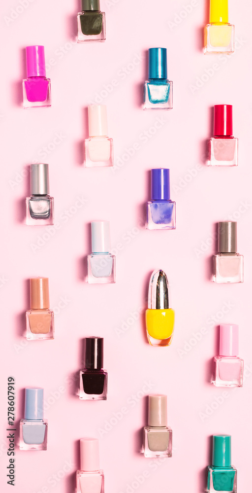 Nail polish bottles pattern background. Close up. Nail polish bottles pattern background. Close up.