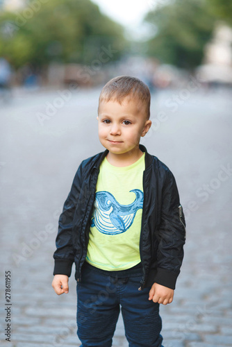 boy standing in street