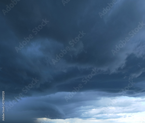 Heavy storm clouds, panorama. Powerful cumulonimbus clouds in front of heavy rain or hail.
